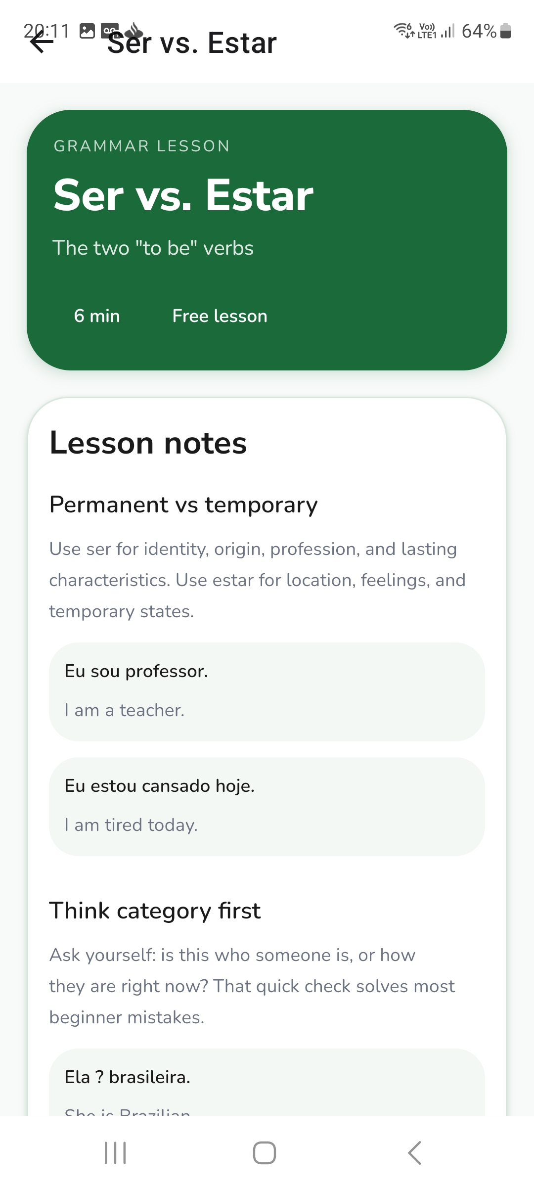 Grammar lesson screen for Ser vs. Estar