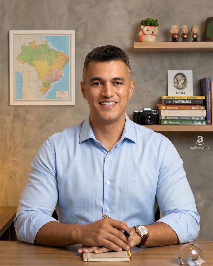 Ed smiling at a desk